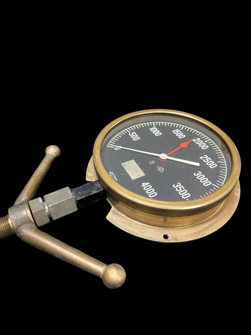A Pressure Gauge (New & Never used) on a black background.