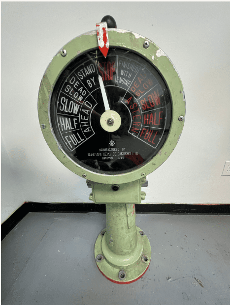 A green and black meter with red indicating the time.
