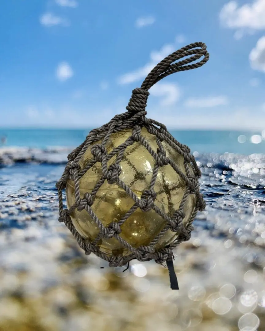 A ball of rope is hanging on the shore.