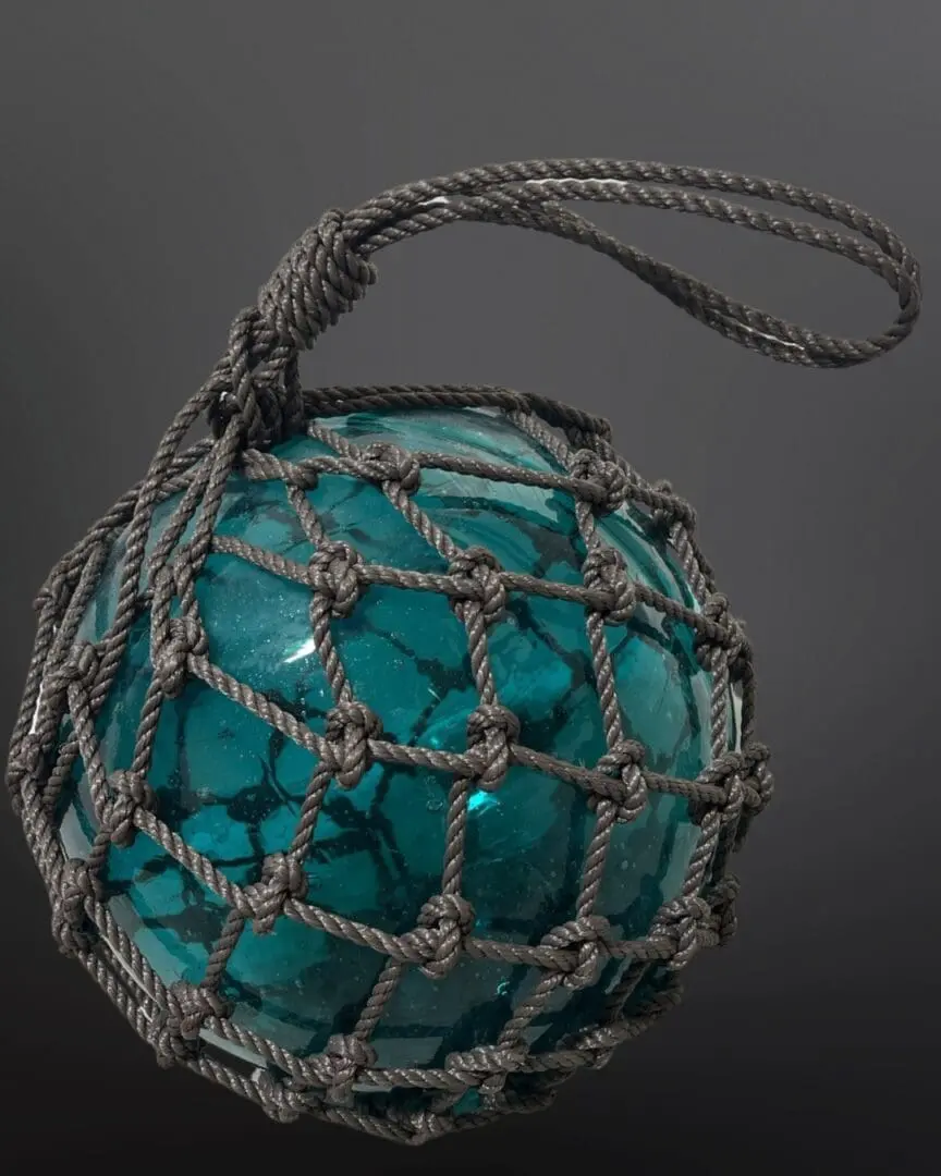 A blue ball with rope around it.