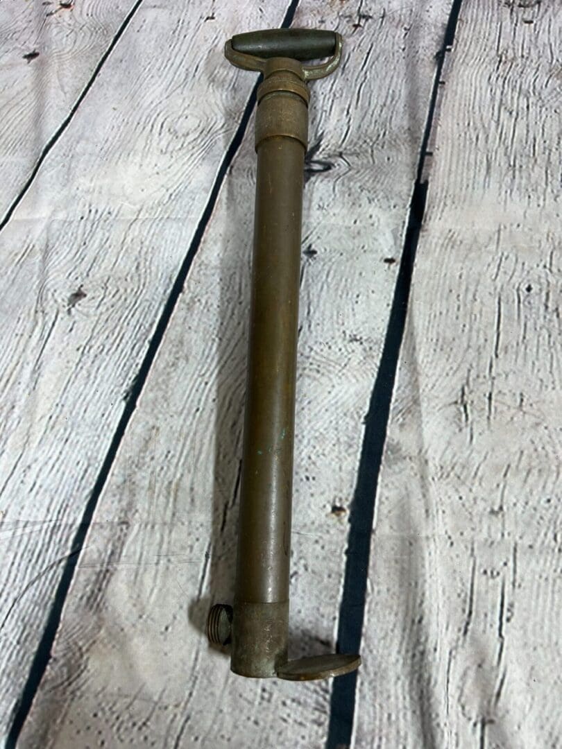 A close up of an old fashioned rifle barrel