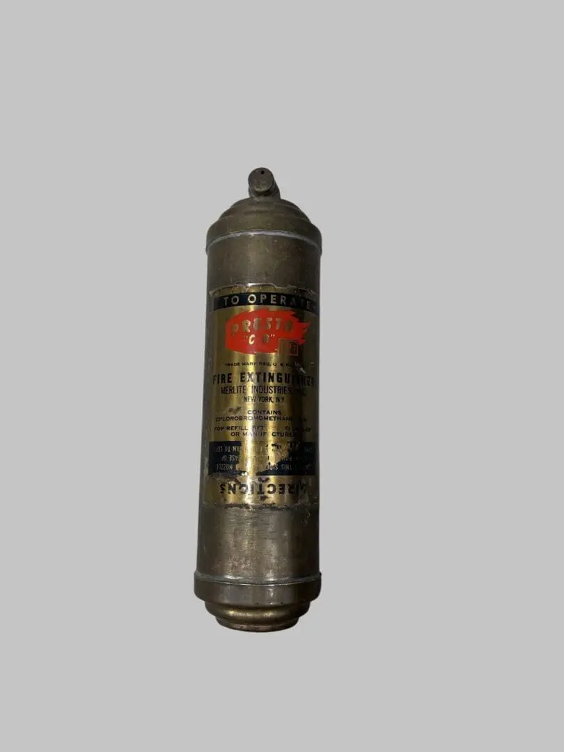 A fire extinguisher is shown with the words " old style " on it.