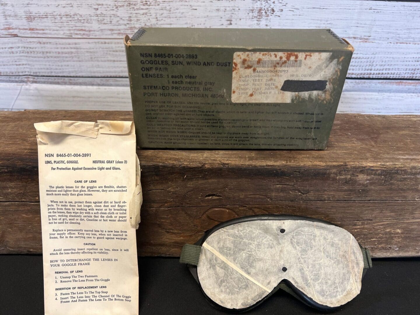 A box of military orders and an old pair of goggles.