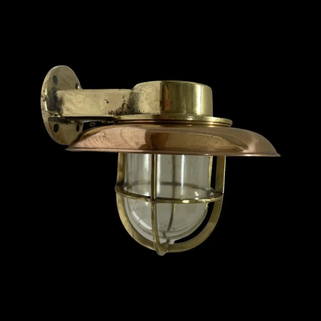 A close up of a light fixture on a black background