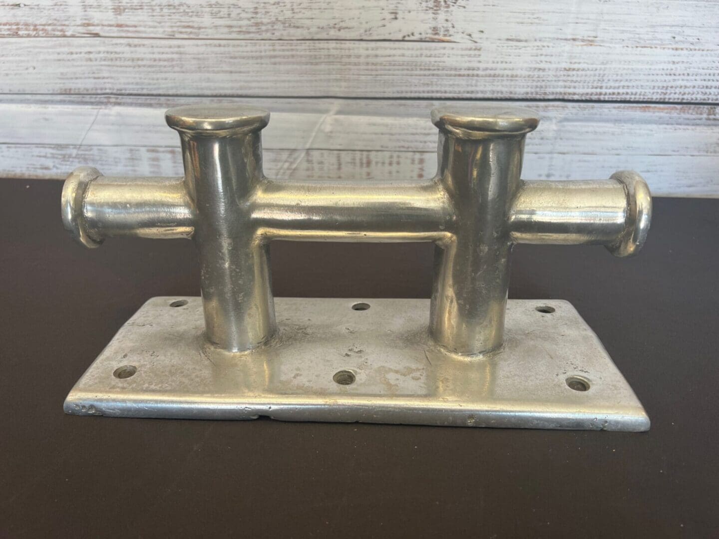 A metal object sitting on top of a table.