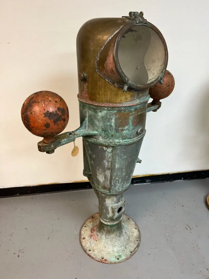 A rusty old fire hydrant with two valves.