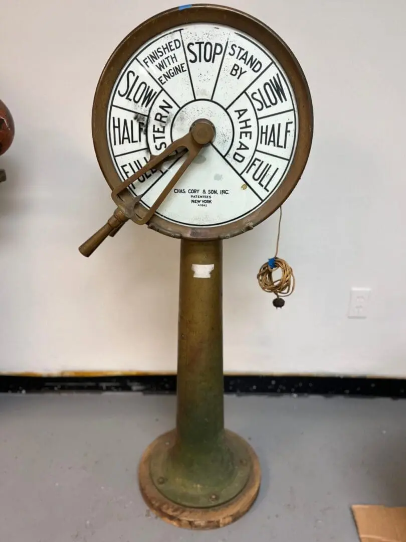 A very old style weather station with some wind direction.