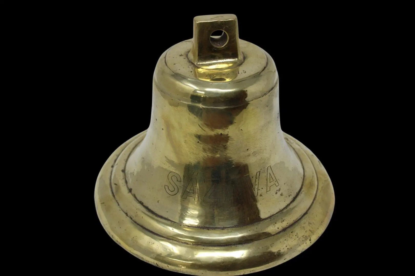 A close up of the top of a bell