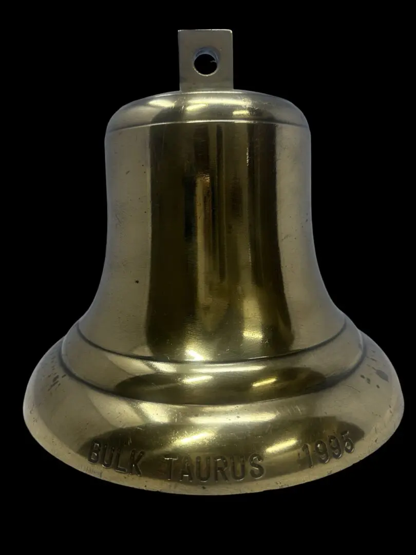 Brass bell inscribed Bulk Taurus 1995.