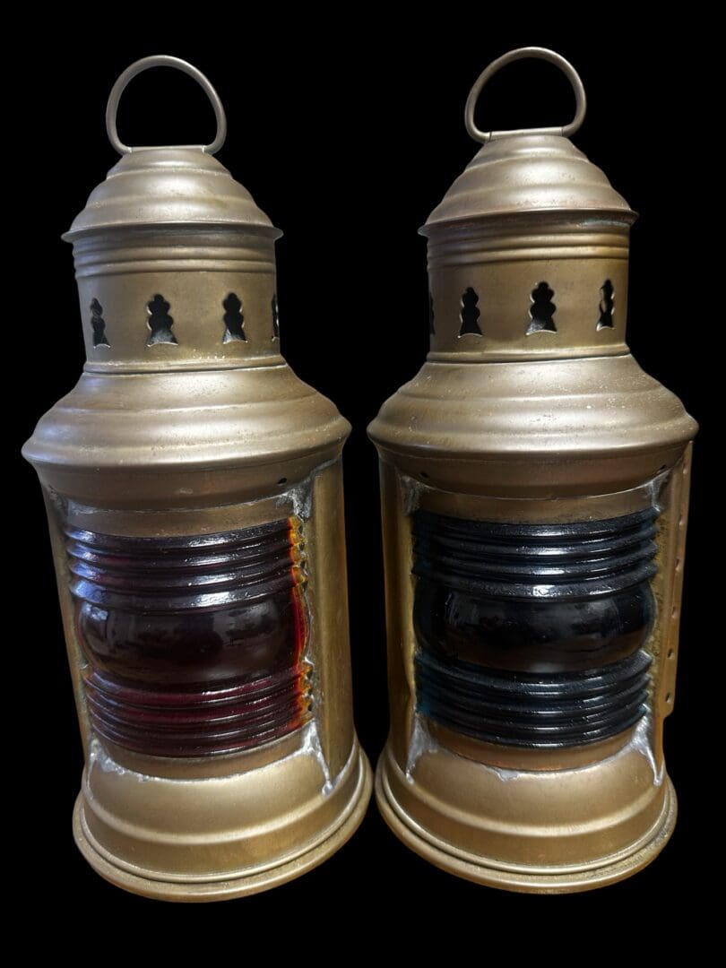 Two antique brass nautical ship lanterns.