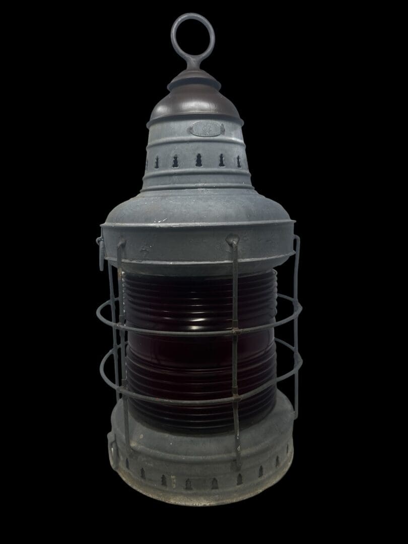 Vintage red lens nautical lantern.