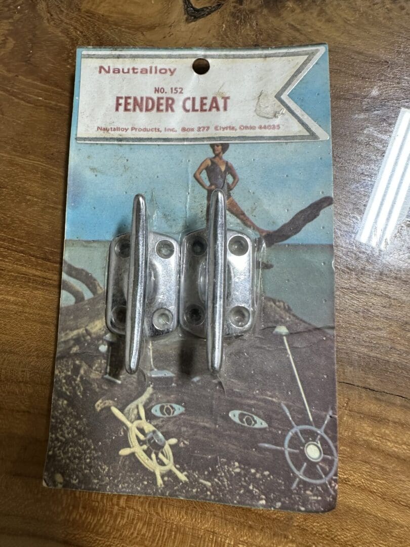 Vintage Nautalloy No. 152 Fender Cleat package with nautical design.